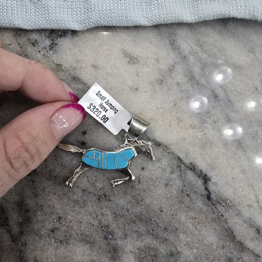 Jumping horse real turquoise